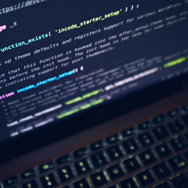 A function being written on a laptop screen
